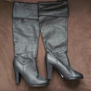 Leather knee high boots.
